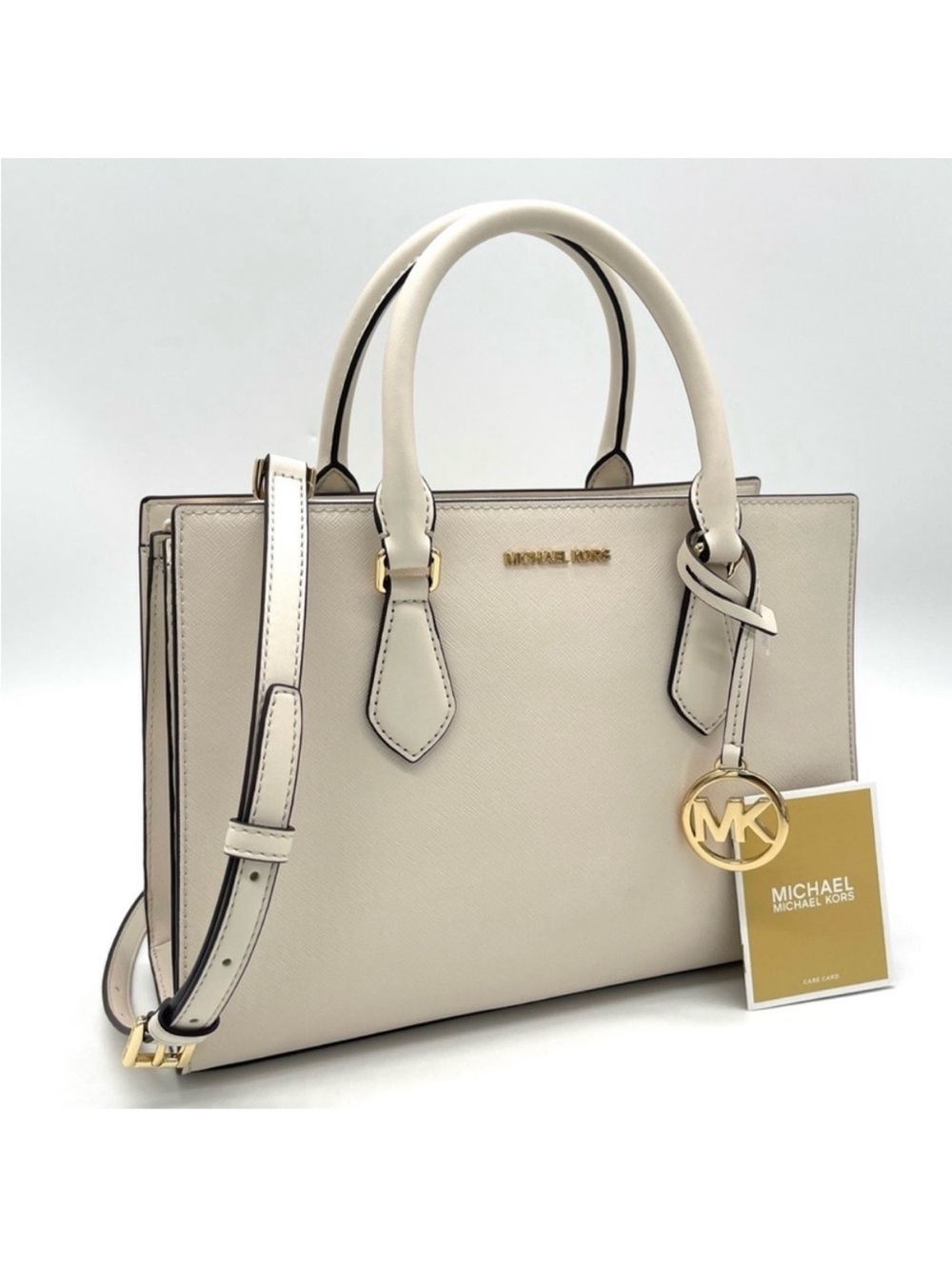 Michael Kors Sheila Medium
Satchel Crossbody Bag Light Cream